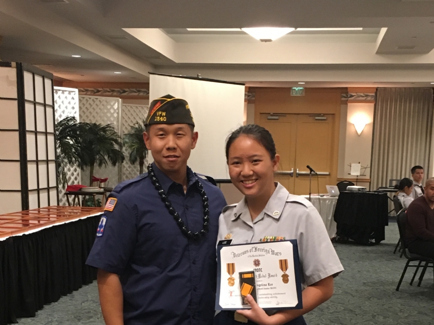 Angelina Lee was awarded by VFW Post 1540's Bryan Choe